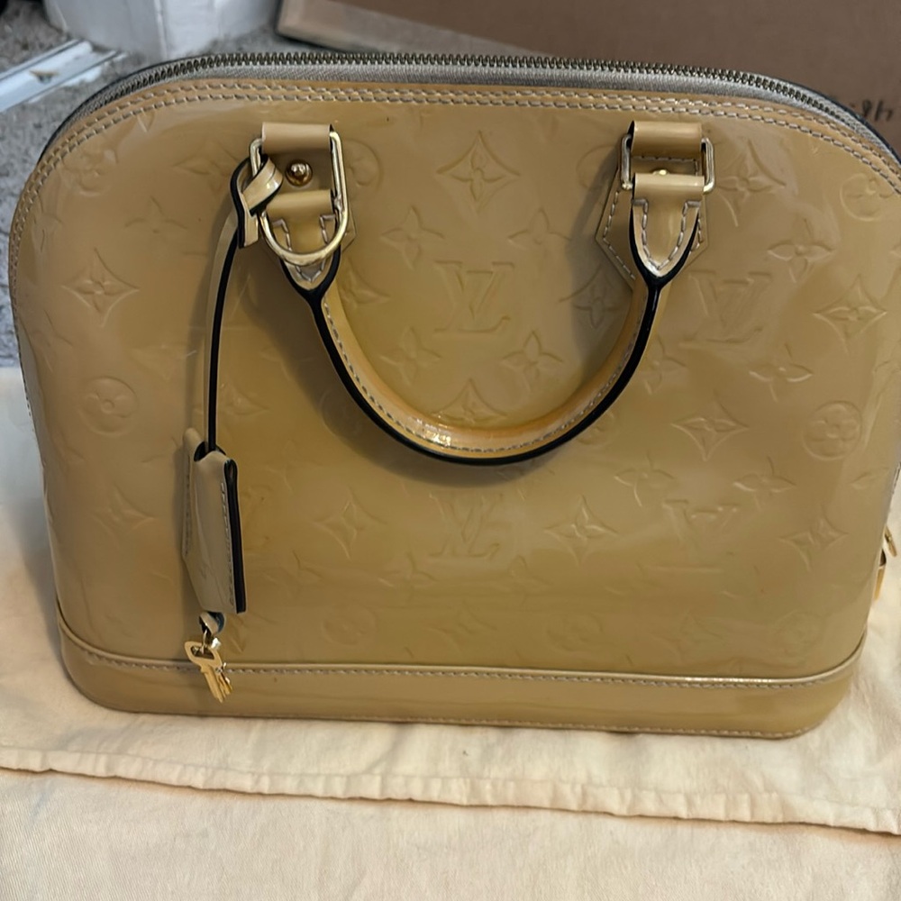 Louis Vuitton 
Alma PM